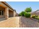 Backyard with gravel, landscaping, and a covered patio at 20856 E Arroyo Verde Dr, Queen Creek, AZ 85142