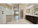Bathroom featuring a glass enclosed shower and double sink vanity at 20856 E Arroyo Verde Dr, Queen Creek, AZ 85142