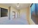 Bedroom featuring a closet with sliding doors and a window with blinds for natural light at 20856 E Arroyo Verde Dr, Queen Creek, AZ 85142