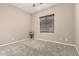 Cozy bedroom featuring neutral walls and plush carpeting at 20856 E Arroyo Verde Dr, Queen Creek, AZ 85142