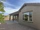 Charming single-story home featuring a covered patio and landscaped backyard at 20856 E Arroyo Verde Dr, Queen Creek, AZ 85142