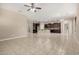 Expansive open concept kitchen with granite island, stainless appliances, and tile flooring at 20856 E Arroyo Verde Dr, Queen Creek, AZ 85142