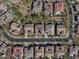 Aerial view of a neighborhood with solar panels and swimming pools at 20964 W Hillcrest Blvd, Buckeye, AZ 85396