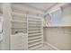 Spacious walk-in closet with ample shelving and hanging space at 20964 W Hillcrest Blvd, Buckeye, AZ 85396