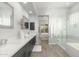 Elegant bathroom with double vanity and shower at 32427 N 71St Way, Scottsdale, AZ 85266