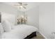 Guest bedroom with a queen bed and large windows at 32427 N 71St Way, Scottsdale, AZ 85266