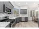 Modern kitchen with stainless steel appliances and gray cabinets at 32427 N 71St Way, Scottsdale, AZ 85266