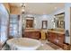 Elegant bathroom with a large soaking tub and double vanity at 8306 N Merion Way, Paradise Valley, AZ 85253