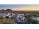 Luxury community with stunning desert mountain views at sunset at 13503 E Charter Oak Dr, Scottsdale, AZ 85259