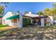 Cozy backyard with covered patio, desert landscaping and charming details perfect for outdoor relaxation and entertaining at 15233 N 5Th Ave, Phoenix, AZ 85023