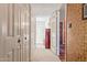 Hallway features multiple closets, fresh paint, and seamless transitions to other rooms at 15233 N 5Th Ave, Phoenix, AZ 85023