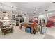 Open-concept living area with a fireplace and a comfortable seating area at 15233 N 5Th Ave, Phoenix, AZ 85023