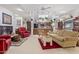 Open concept living area with fireplace, ceiling fan, and seating at 15233 N 5Th Ave, Phoenix, AZ 85023