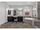 Bathroom with double vanity, soaking tub, and walk-in shower at 17408 N 96Th Way, Scottsdale, AZ 85255