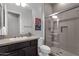 Bathroom with vanity, toilet and walk-in shower at 17408 N 96Th Way, Scottsdale, AZ 85255