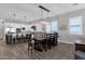 Large dining room with dark wood table and seating for eight at 17408 N 96Th Way, Scottsdale, AZ 85255