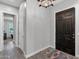 Bright foyer with tile floors and view into hallway at 17408 N 96Th Way, Scottsdale, AZ 85255