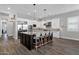 Modern kitchen with large island and stainless steel appliances at 17408 N 96Th Way, Scottsdale, AZ 85255