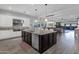 Open concept kitchen with island, stainless steel appliances, and view to Gathering room at 17408 N 96Th Way, Scottsdale, AZ 85255