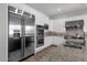 Spacious kitchen featuring stainless steel appliances and granite countertops at 17408 N 96Th Way, Scottsdale, AZ 85255