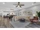 Open living area with sectional sofa, view to kitchen and dining area at 17408 N 96Th Way, Scottsdale, AZ 85255