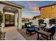 Relaxing patio with seating area, artificial turf, and mountain views at 17408 N 96Th Way, Scottsdale, AZ 85255