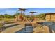 Modern playground with slides and climbing structures at 17408 N 96Th Way, Scottsdale, AZ 85255