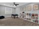 Playroom with table, chairs, and built-in shelving at 17408 N 96Th Way, Scottsdale, AZ 85255