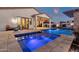 Luxury pool and spa with a covered patio and outdoor seating at 17408 N 96Th Way, Scottsdale, AZ 85255