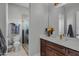 Bathroom features wood vanity, toilet and shower at 20668 E Sunset Dr, Queen Creek, AZ 85142