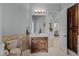 Elegant bathroom with wood vanity and marble countertop at 20668 E Sunset Dr, Queen Creek, AZ 85142