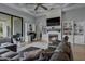 Relaxing Gathering room with fireplace and built-in shelving at 20668 E Sunset Dr, Queen Creek, AZ 85142