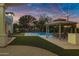 Stunning pool and patio area with string lights and gazebo at 20668 E Sunset Dr, Queen Creek, AZ 85142