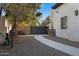 Side yard with gate and landscaping at 20668 E Sunset Dr, Queen Creek, AZ 85142