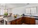 Kitchen with dark wood cabinets and an island at 306 N 21St Cir, Coolidge, AZ 85128