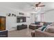 Living Room with L-shaped sofa, large TV and decorative wall art at 306 N 21St Cir, Coolidge, AZ 85128