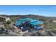 Aerial view of a new modern home's construction on a hillside lot at 9609 N Palisades Blvd, Fountain Hills, AZ 85268