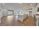 Bright kitchen boasts a large island and open layout, perfect for entertaining at 17316 W Via Dona Rd, Surprise, AZ 85387