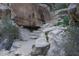 Rocky path with stairs leading to a cave-like opening at 22262 W Tonto St, Buckeye, AZ 85326