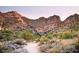 Desert hiking trail with mountains in background at 22262 W Tonto St, Buckeye, AZ 85326