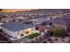 Aerial view showcasing a backyard oasis with a covered patio at 2453 N 211Th Ln, Buckeye, AZ 85396