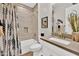 Clean bathroom with bathtub and modern vanity at 2453 N 211Th Ln, Buckeye, AZ 85396