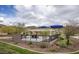 Community BBQ area with pergola, grills, and shade structures at 2453 N 211Th Ln, Buckeye, AZ 85396