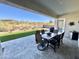 Patio furniture on a covered patio with a view of the backyard at 2453 N 211Th Ln, Buckeye, AZ 85396