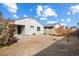 Large backyard with gravel and a view of the house at 41369 W Crane Dr, Maricopa, AZ 85138