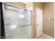 Clean bathroom featuring a shower stall and built-in shelving at 41369 W Crane Dr, Maricopa, AZ 85138