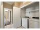 Convenient laundry room with washer and dryer included at 41369 W Crane Dr, Maricopa, AZ 85138