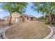 Expansive backyard with a charming patio and lush lawn, perfect for outdoor gatherings and play at 5531 W Gwen St, Laveen, AZ 85339
