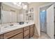 Double vanity bathroom with updated fixtures at 13653 W Jesse Red Dr, Peoria, AZ 85383