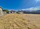Spacious backyard with gravel and two storage buildings at 2112 N 24Th Pl, Phoenix, AZ 85008